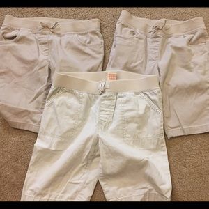 Lot of 8 girls uniform bottoms. Shorts and skorts